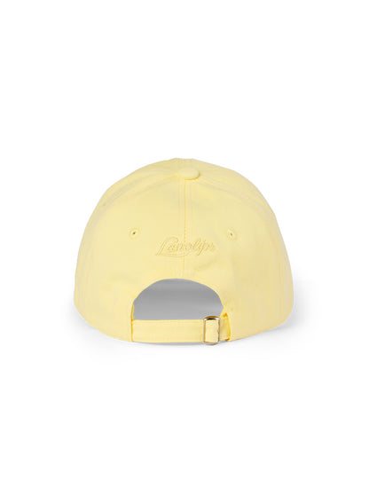 Lanolips Go Bananas Yellow Cap showcases a back view with an adjustable slider fastening, allowing you to easily customise the fit for most head sizes. The cap also features the iconic Lanolips logo on the back, adding a touch of brand flair to your style.
