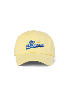 Lanolips Go Bananas Yellow Cap front view. Made with 100% cotton, and the Go Bananas embroidered slogan at the front. 