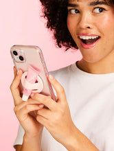 Load image into Gallery viewer, Model holding the Lanolips Lip Balm Phone Holder
