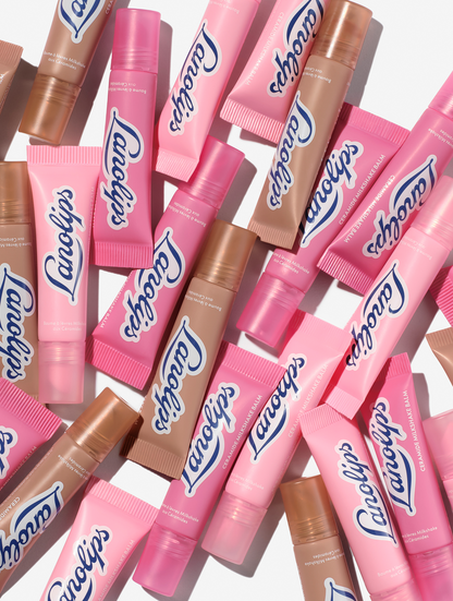 Lanolips ceramide milkshake mini balms lip balm tubes in pink and brown packaging on a white background.