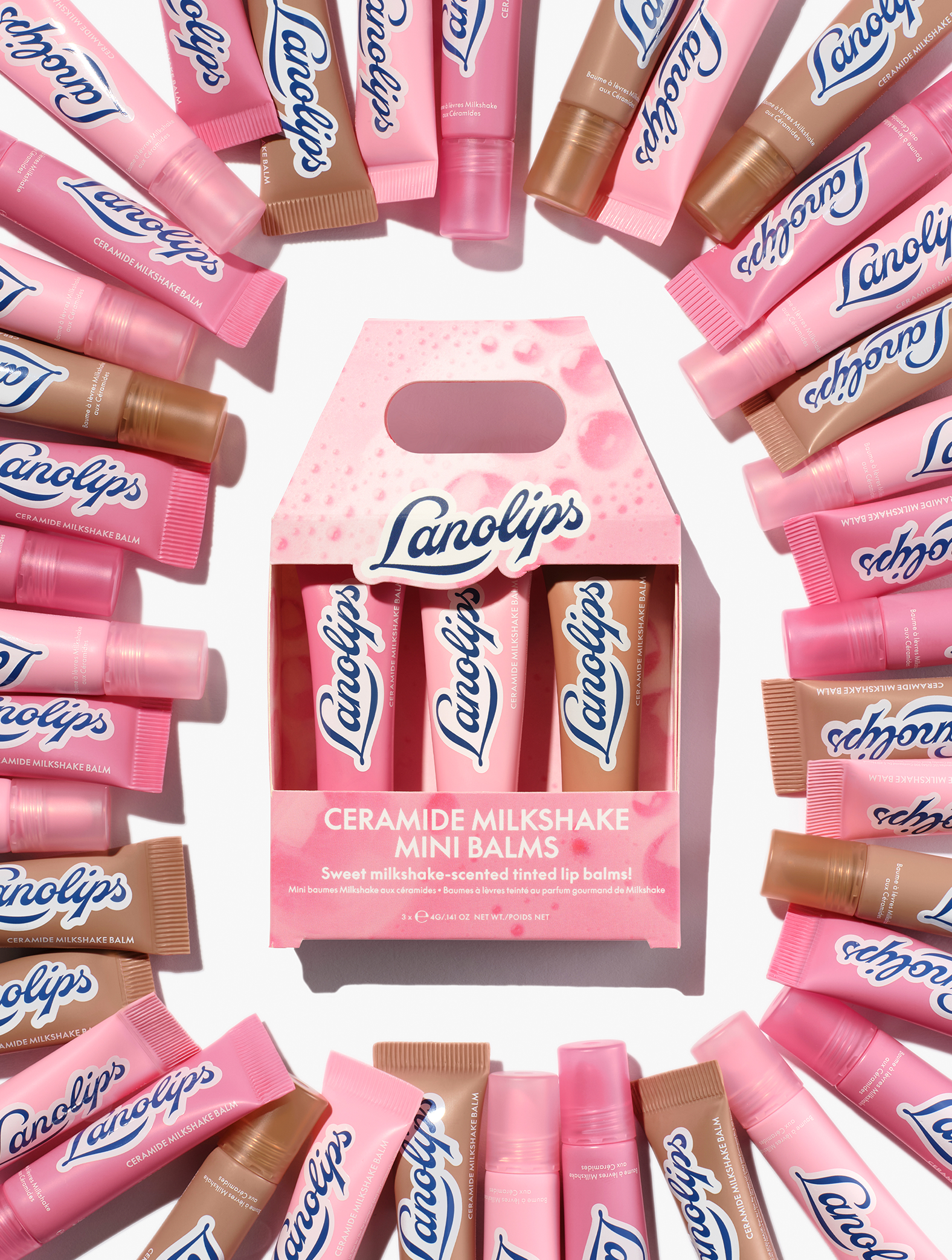 Lanolips ceramide milkshake lip balm packaging with pink and brown lip balms on a white background.