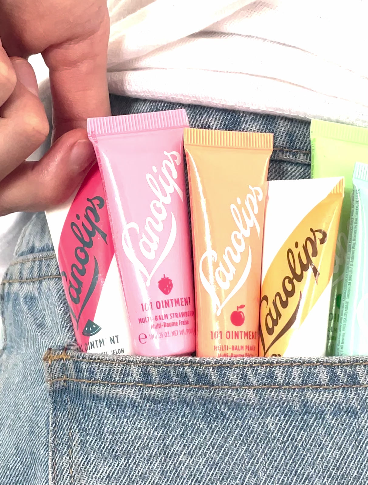 Video of Lanolips 101 Ointment Fruities. The 101 Ointment Frutiies comes in eight fruity flavours: Coconutter, Strawberry, Peach, Green Apple, Pear, Minty, Watermelon and Vanilla. Made with ultra-rich lanolin, infused with vitamin e and all-natural fruit extracts - it nourishes dry and chapped lips.
