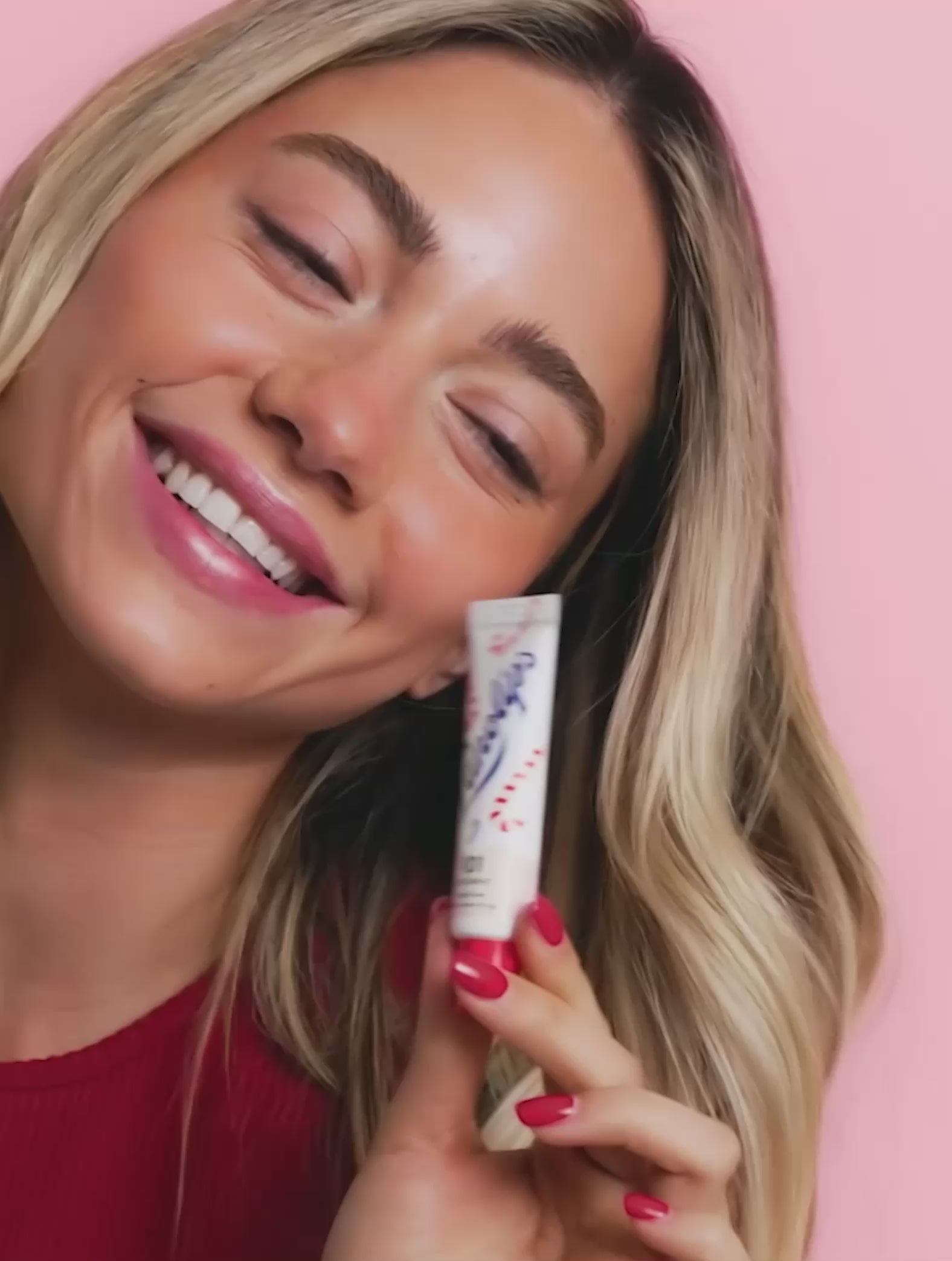 Video of model using the Lanolips 101 Ointment Multi-Balm Candy Cane, a limited edition festive gourmand flavour. 