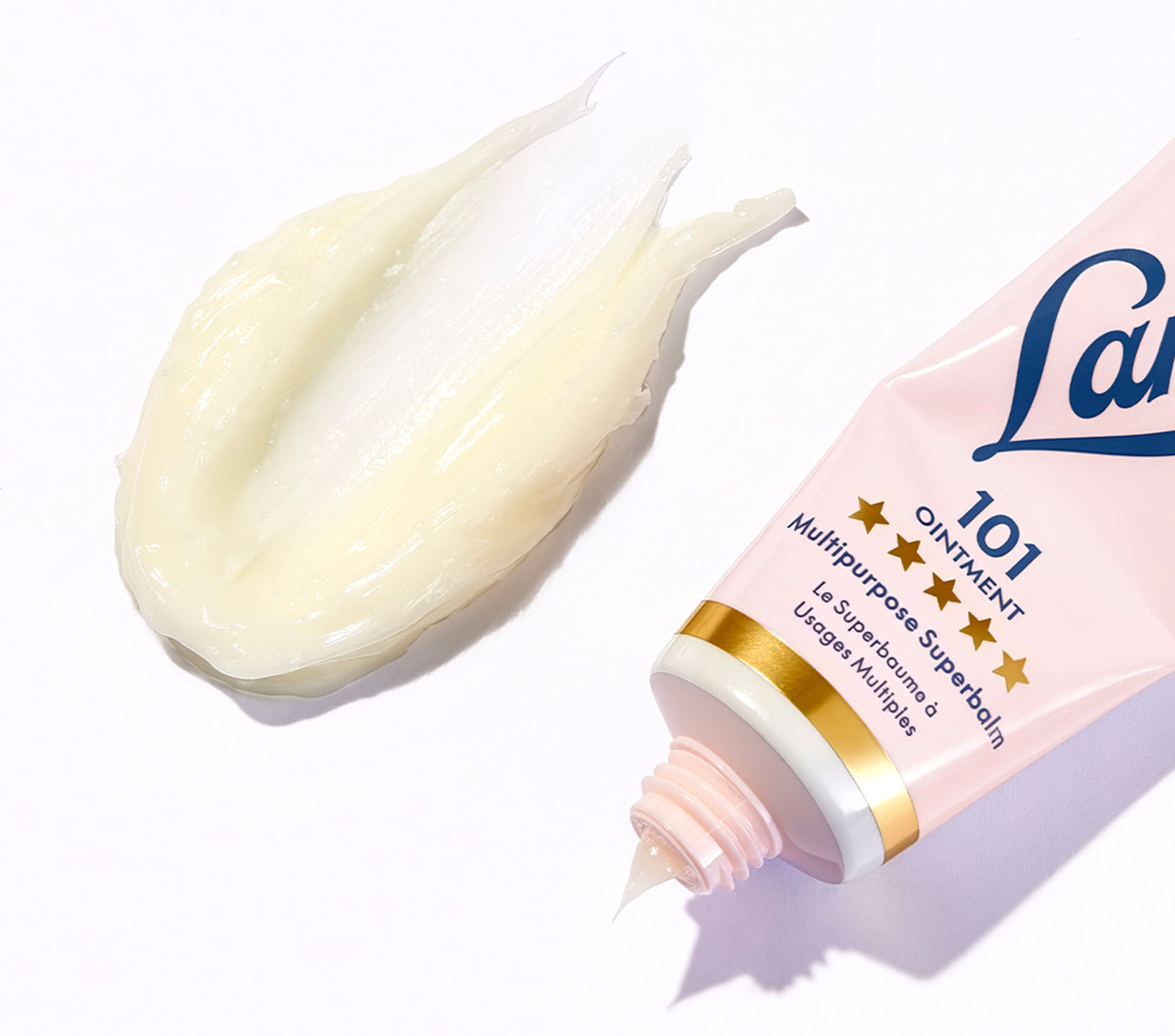 Lanolips 101 ointment multipurpose superbalm tube showing the ultra pure grade lanolin texture.