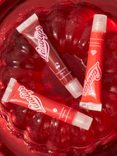 Load image into Gallery viewer, Lanolips Fruity Jellybalms are soft, bouncy and shiny. It is a tinted lip balm that works like a lip stain, but drenched in the intense Lanolips hydration you know and love.
